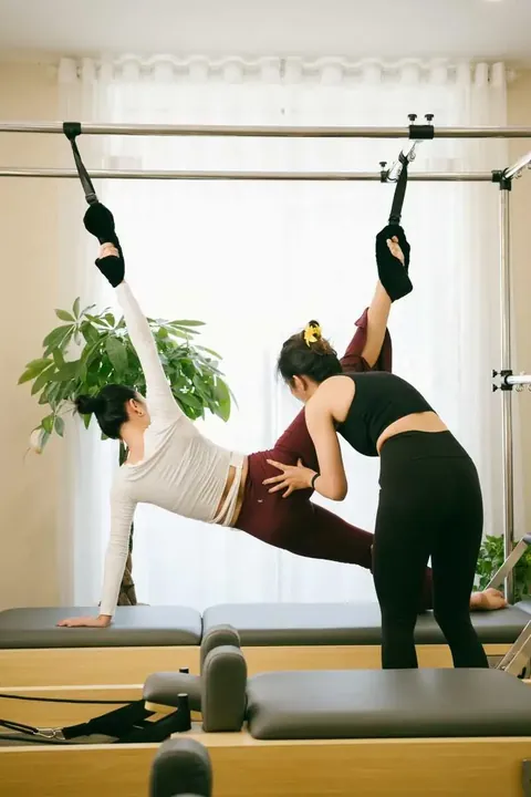 Ori Pilates instructor guiding a client during a private session
